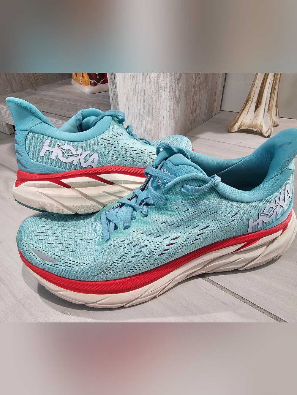 HOKA Women's Light Blue Running Shoes with Red Accent